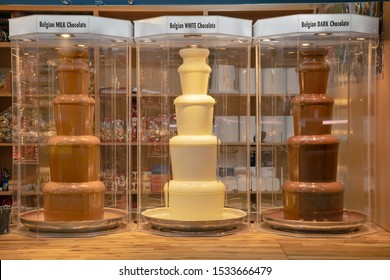 Three Chocolate Fountains In Budapest Market Hall, Hungary, AUGUST 2019, White, Milk And Dark Chocolate