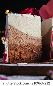 Three Chocolates Cake. Layered Cake With Milk, Black And White Chocolate Souffle. 