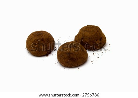 three chocolate's truffles on the white background Zdjęcia stock © 