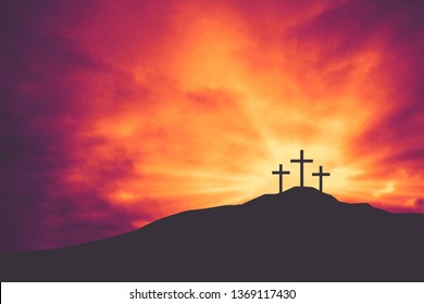 Three Christian Easter and Good Friday Holiday Crosses on Hill of Calvary with Colorful Clouds in Sky - Crucifixion of Jesus Christ Background