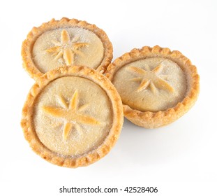 Three Christmas mince pies on a white background - Powered by Shutterstock