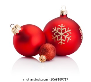 Three Christmas red baubles isolated on a white background