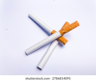 three cigarettes, Three loose cigarettes, A stack of cigarettes white background