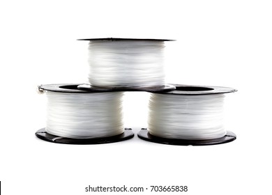 Three Clear Nylon Line In Roll For Fishing Or Construction Work Isolated On White Background