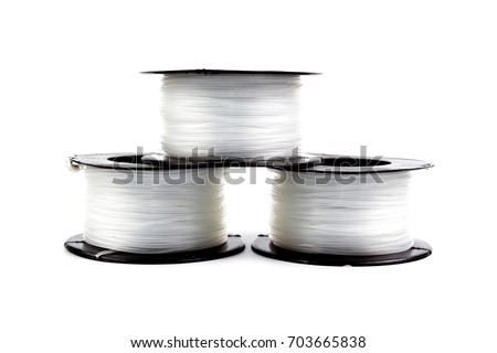 Three Clear Nylon line in roll for fishing or construction work isolated on white background