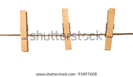 three clothespins on rope