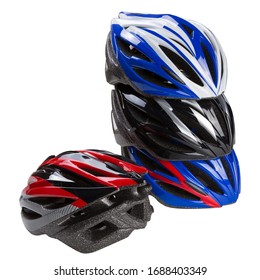 three colored bicycle protective helmets, stand in a stack, one on top of the other, one helmet is nearby, concept, on a white background, isolate