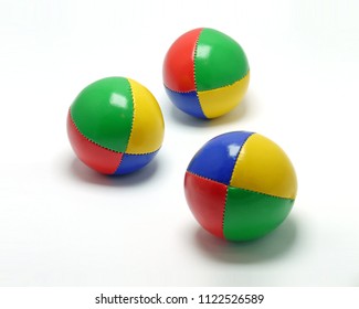 Three Colorful Juggling Balls On White Background