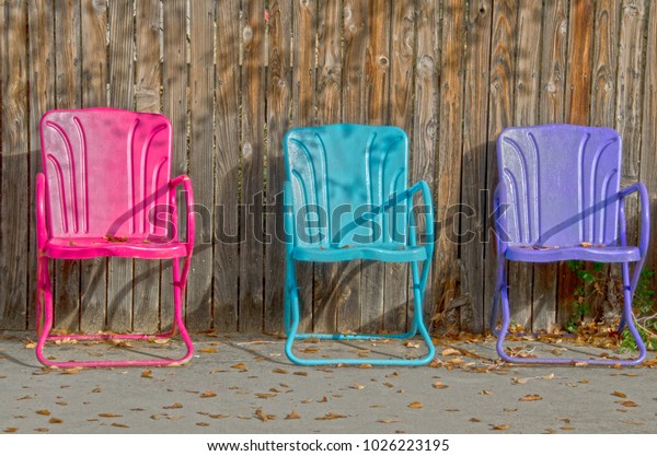 Three Colorful Lawn Chairs Sit Empty Objects Stock Image