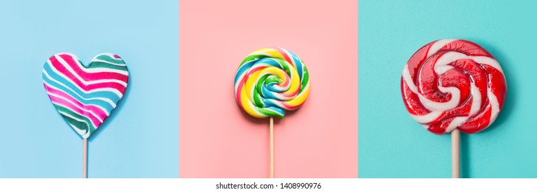 Three colorful lollipops candy as heart and swirl