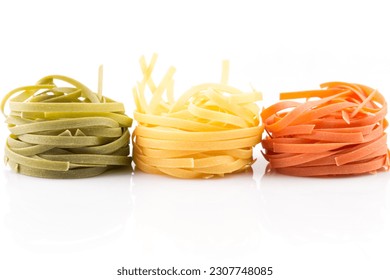 three colour roll nest pasta on a white background - Powered by Shutterstock