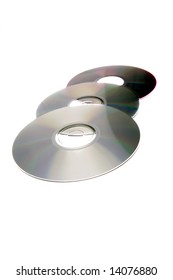 Three compact discs on white