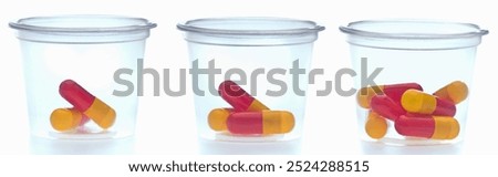 Three containers with different amount of pills, over white