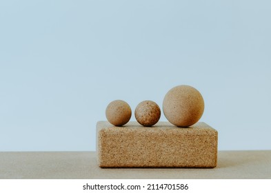 Three Cork Massage Balls For Fascia On A Cork Block On A Cork Yoga Mat. Concept: Eco Friendly And Biodegradable Props For Self Care At Home