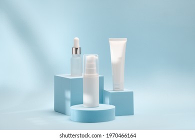 Three cosmetic product mockups on geometric podiums. Background for presentation of cosmetic - Shutterstock ID 1970466164