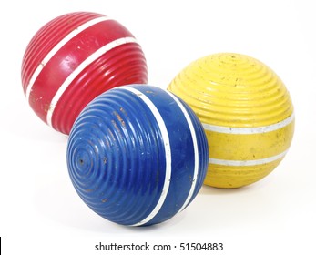 Three croquet balls, blue, red and yellow. Working path included.