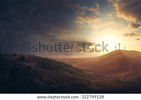 Three crosses in the distance in the desert