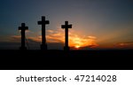 Three crosses on sunset.