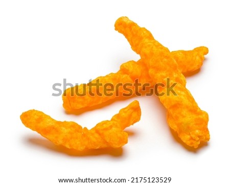 Three Crunchy Cheese Puffs Cut Out on White.