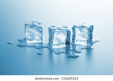 Three Cubes Of Frozen Ice Are Melting