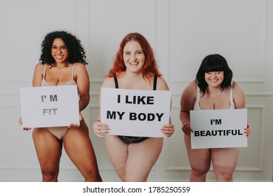 Three Curvy Girls Posing In Lingerie And Having Fun. Concept About Body Positivity