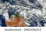 Three Cyclones Churn Off Australia. While powerful cyclone Pam headed toward Vanuatu, two other storms neared Australia. Elements of this image furnished by NASA.