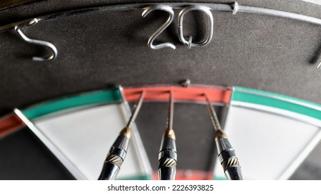 Three darts in the doubling 20 sector. Playing darts 120 scored with three darts - Shutterstock ID 2226393825