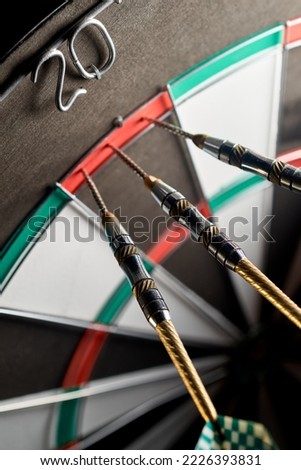 Three darts in the doubling 20 sector. Playing darts 120 scored with three darts