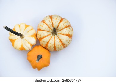 Three decorative pumpkins placed on one side, with space for text.