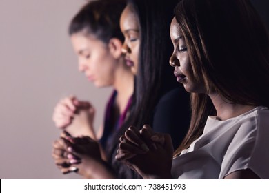 Three Dedicated Christian Ladies Praying To God