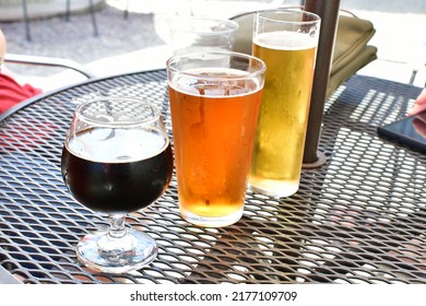 Three different beers on a table