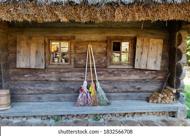 Three Different Brooms Of Witches Stand At The House