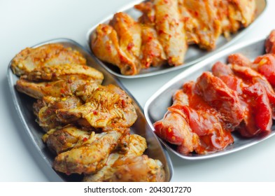 Three Different Set Of The Chicken Wings With Sriracha Glaze, Caribbean Marinade And Chinese Glaze, Meals World Cuisine Prepared To Cook