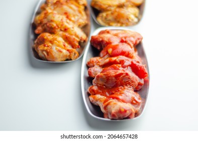 Three Different Set Of The Chicken Wings With Sriracha Glaze, Caribbean Marinade And Chinese Glaze, Meals World Cuisine Prepared To Cook