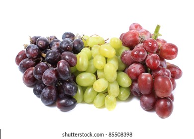 Three Different Types Of Grapes In Red, Green And Black On White Background