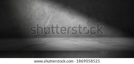Three dimensional dark room with concrete wall and cement floor, product display background with spot light, stone texture backdrop Foto d'archivio © 