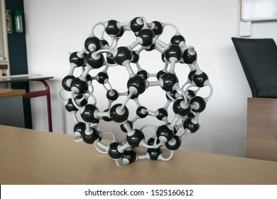 Three dimensional model of a carbon molecule (C60) also known as fullerene or  buckminsterfullerene. Football shaped molecule model used in chemistry or biology class.