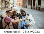 Three diverse senior male friend tourist exploring city