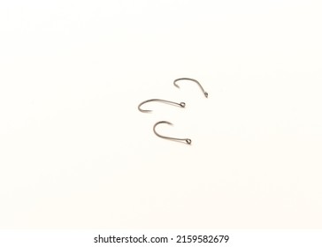 Three Drop Shot Fishing Hooks Size 2 Made From High Carbon Steel Isolated On White Background. Ultra-sharp And Super Durable Needlepoint Hook Point.