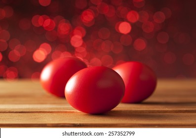 Three Easter Eggs On Red Background