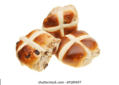 Three Easter hot cross buns isolated on white