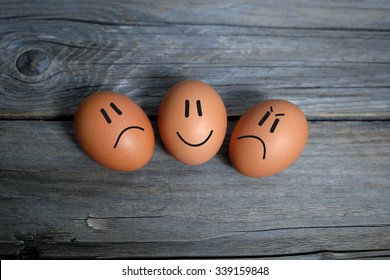 Three Eggs With Happy, Sad And Angry Face