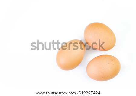 Three eggs are isolated on a white background