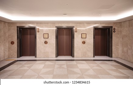 Three Elevator Doors In Building