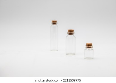 Three Empty Apothecary Bottles Isolated On A White Background.