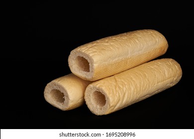 Three empty buns isolated on black background. - Shutterstock ID 1695208996