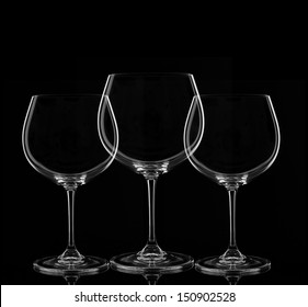 Three Empty Wine Glasses On Black Background