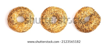Three Evertything Bagels on a White Background