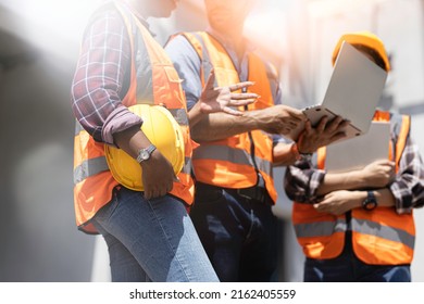 Three experts inspect commercial building construction sites, industrial buildings real estate projects with civil engineers, investors use laptops in background home, concrete formwork framing.