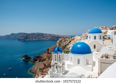 Three famous blue domes of Santorini Oia in one photograph. 